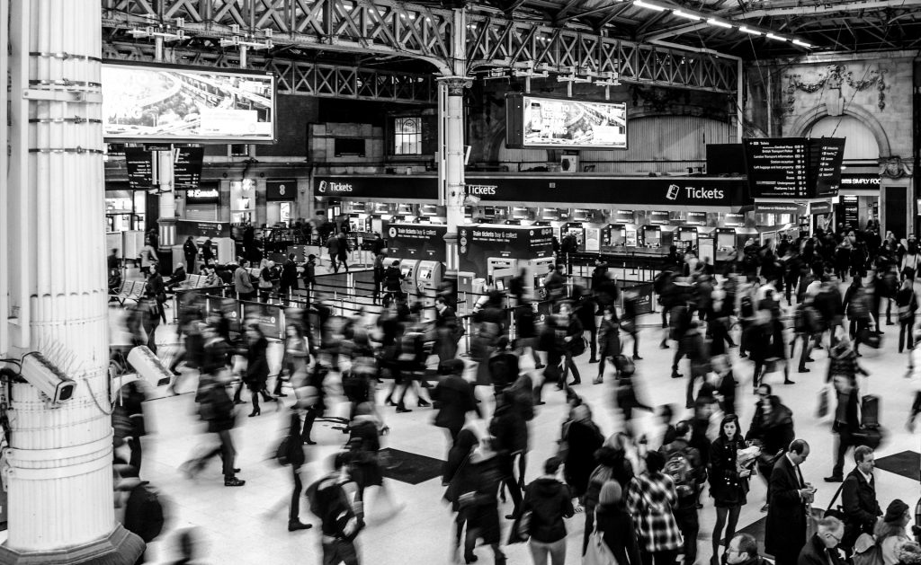 Photo by Skitterphoto: https://www.pexels.com/photo/grayscale-photography-of-people-walking-in-train-station-735795/