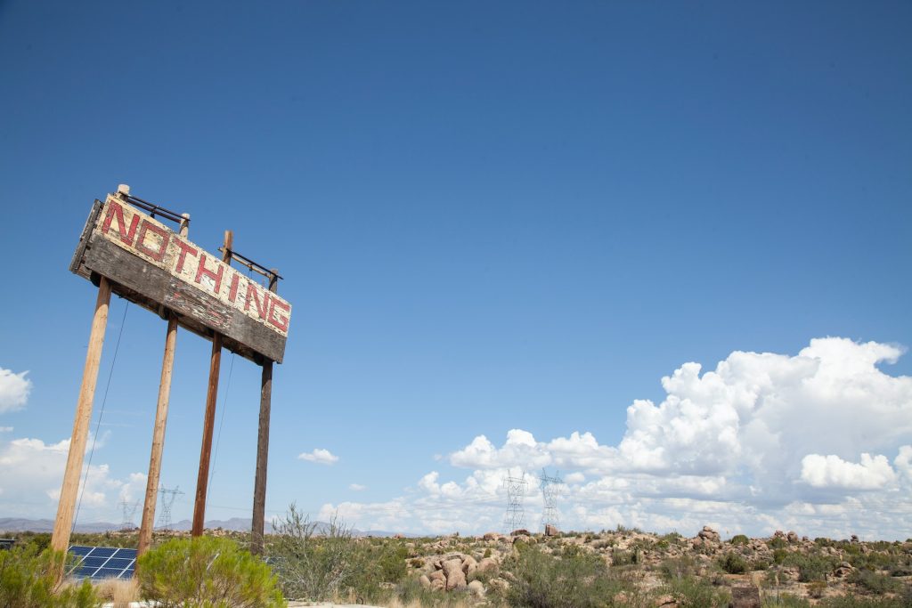 Photo by imustbedead : https://www.pexels.com/photo/brown-wooden-signage-on-green-grass-field-under-blue-sky-and-white-clouds-11256830/