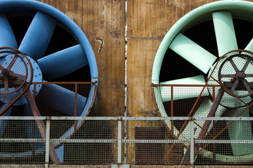 Photo by Mike van Schoonderwalt: https://www.pexels.com/photo/massive-ventilators-of-industrial-building-5502720/